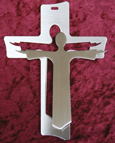 Wandkreuz mit Jesus davor